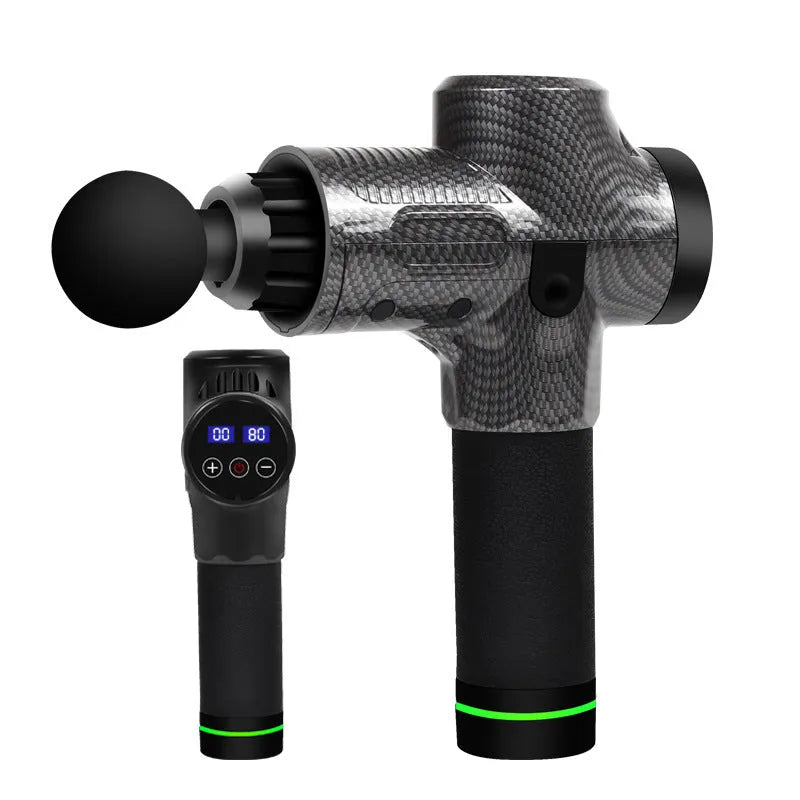 Black electric muscle massage gun with 7 different attachment heads on a table.