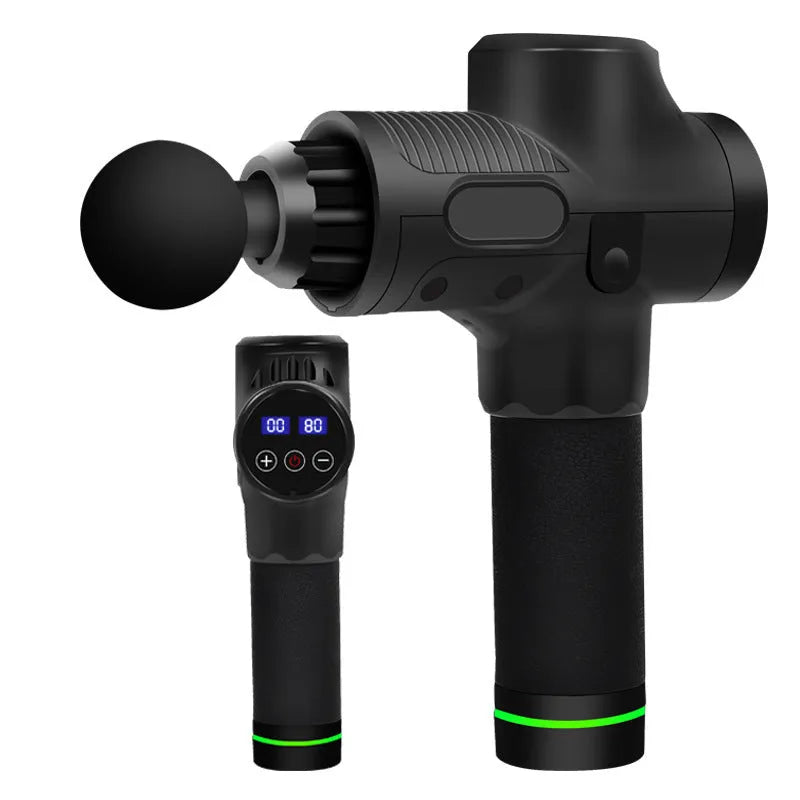 Black electric muscle massage gun with 7 different attachment heads on a table.