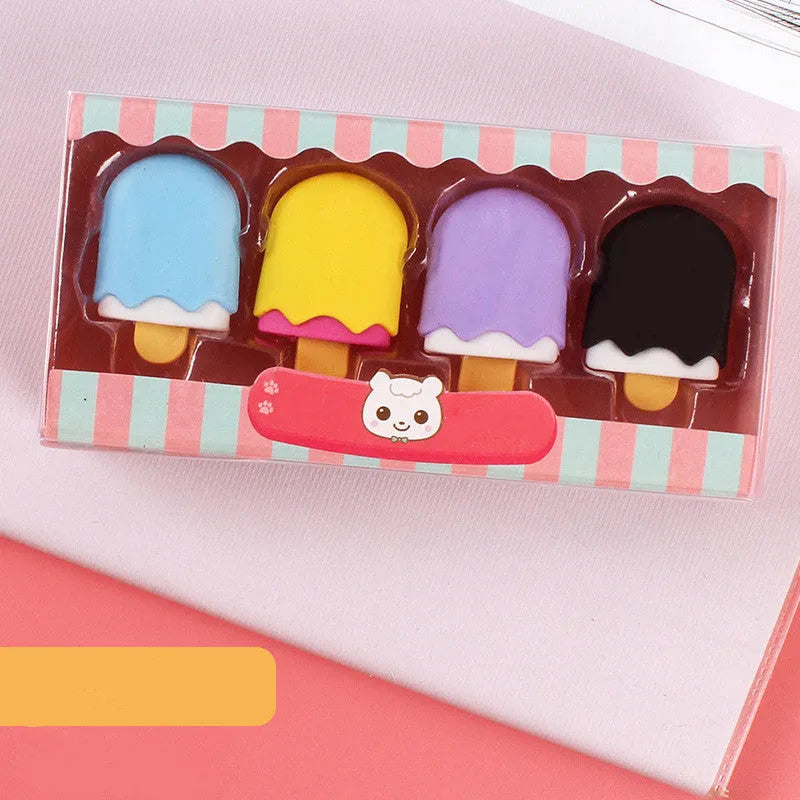 Assortment of 12 colourful cartoon erasers shaped like ice cream, lollipops, doughnuts, and cones for children.