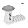 White 2-in-1 mushroom lamp USB charger with Qualcomm Quick Charge 3.0 on a wooden desk