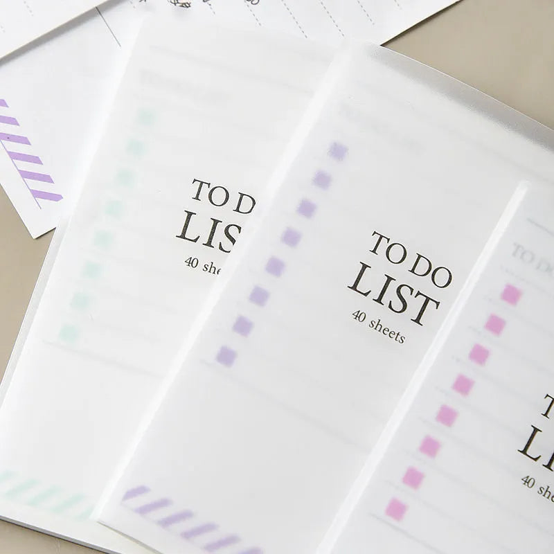 Yellow, green, and purple A6 tearable notebooks with frosted PP covers, showing size of 13 by 8 cm