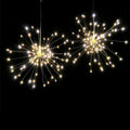 Solar-powered LED meteor shower string lights creating starry explosion effect in warm white colour