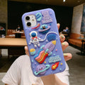 Purple silicone iPhone case with a cartoon astronaut graphic, showing front and back views.