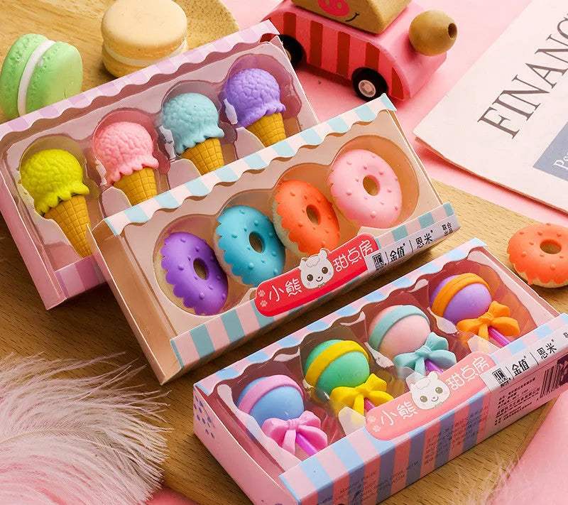 Assortment of 12 colourful cartoon erasers shaped like ice cream, lollipops, doughnuts, and cones for children.