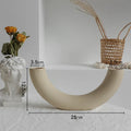 Unglazed matte ceramic vase for dry flower arrangements with textured finish