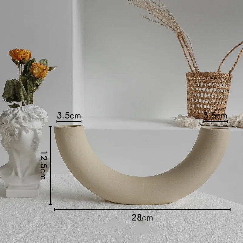 Unglazed matte ceramic vase for dry flower arrangements with textured finish