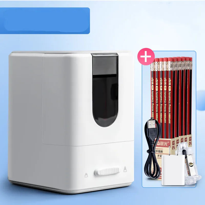 Chenguang electric pencil sharpener in white with spare knife holder, power cord and two Toshiba batteries on a desk