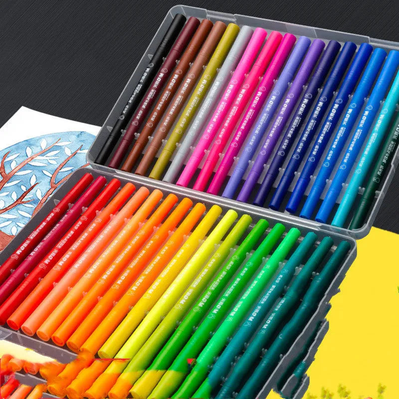 Double-ended watercolour pen set with soft brush head and fine point tip alongside drawing book
