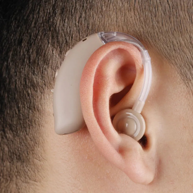 G25 hearing aid sound collector amplifier in blue skin-tone colour with charging port