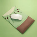 Green kiwi and calculator design on a thick, soft silicone wrist support mouse pad.