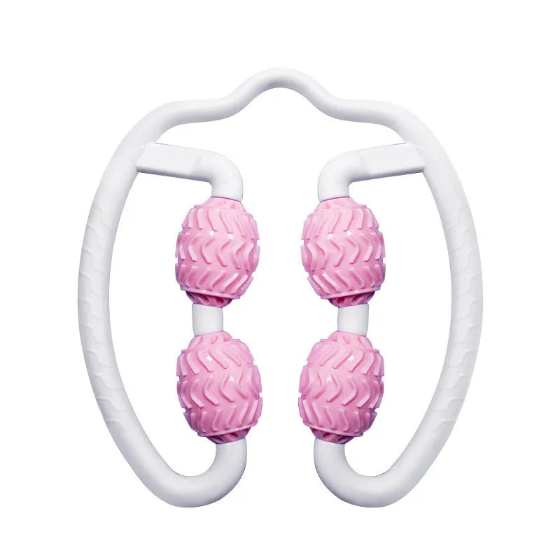 Purple and pink silicone annular leg massage roller on a plain background.