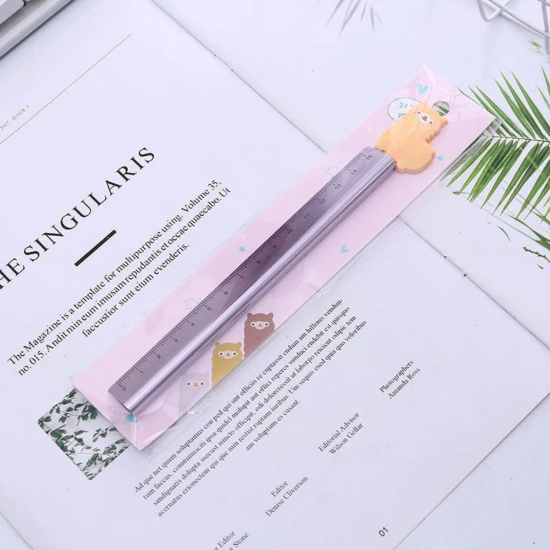 30 centimetre long silver aluminum ruler with black printed measurement scales.