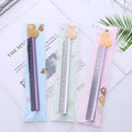 30 centimetre long silver aluminum ruler with black printed measurement scales.