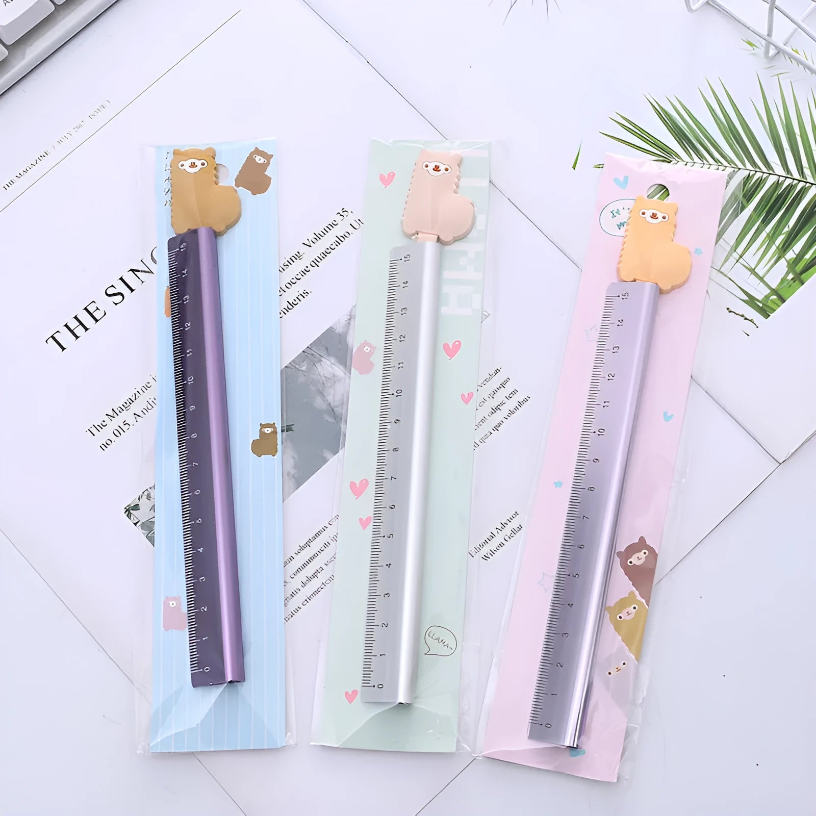 30 centimetre long silver aluminum ruler with black printed measurement scales.