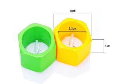 Yellow and green plastic spiral vegetable cutter on a kitchen counter.