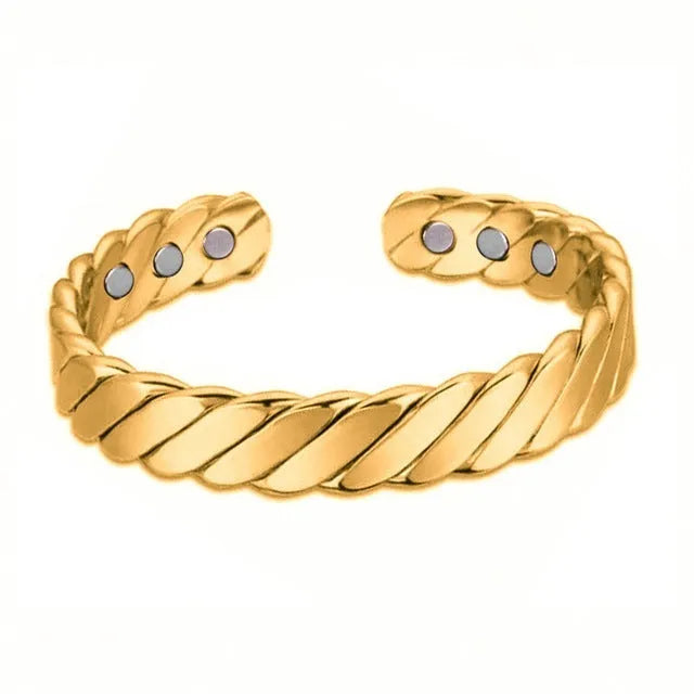 Silver tone metal bracelet on a flat surface, unisex design for men women children