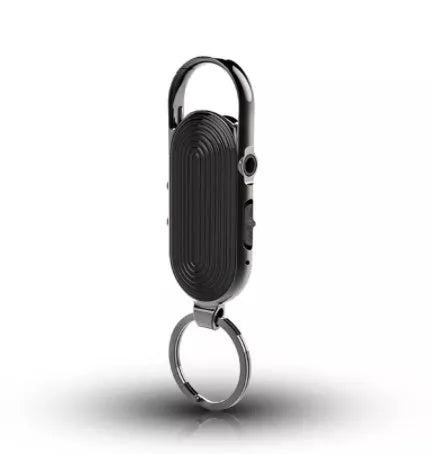 Black portable voice recorder with zinc alloy shell, showing USB port and recording button.