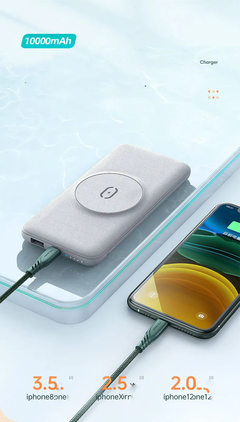 Mint green magnetic wireless power bank with back clip, shown next to a compatible iPhone.