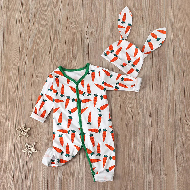 Red cotton baby romper jumpsuit for toddlers on a hanger