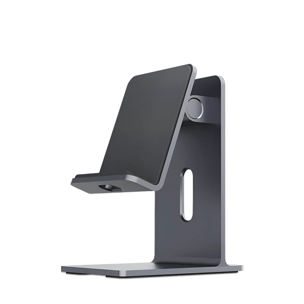 Dark space grey alloy mobile phone and tablet holder on a wooden desktop.