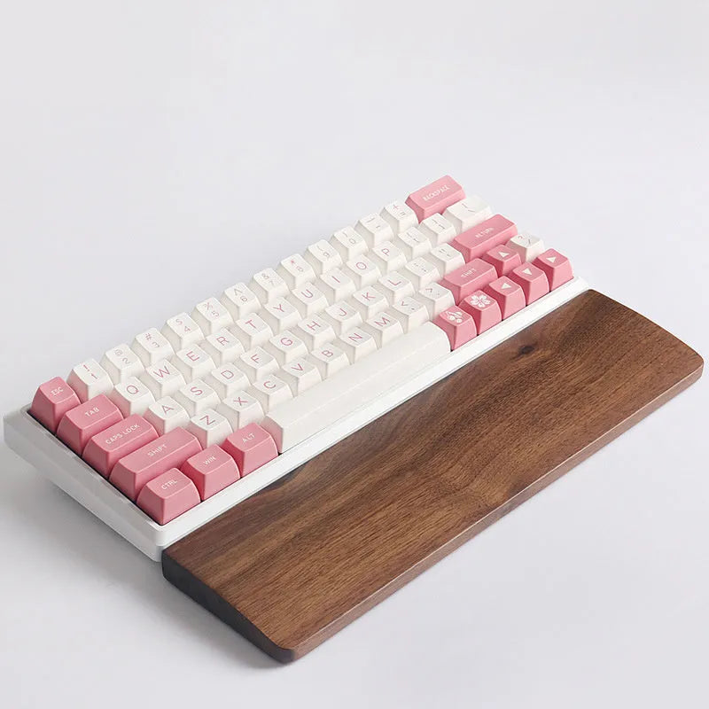 Walnut wood mechanical keyboard wrist rest showing natural wood grain