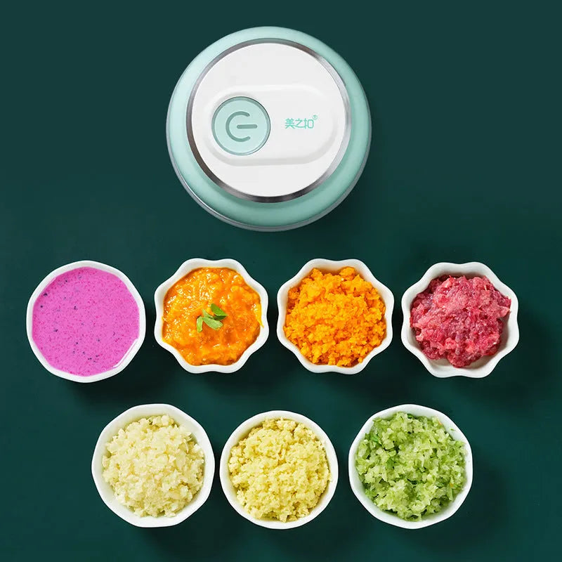 Portable USB rechargeable electric food chopper with transparent cup and stainless steel blade.
