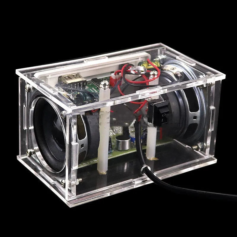 DIY bluetooth speaker assembly kit showing electronic components and transparent shell enclosure