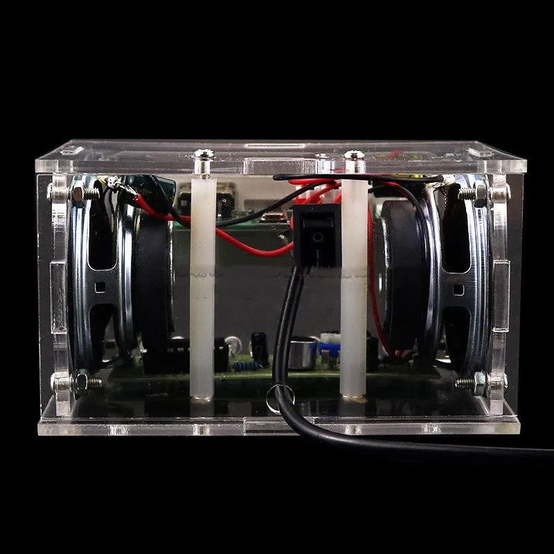 DIY bluetooth speaker assembly kit showing electronic components and transparent shell enclosure