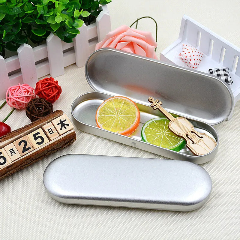 Rectangular tinplate cosmetic box with dimensions 175x60x18mm for pen storage