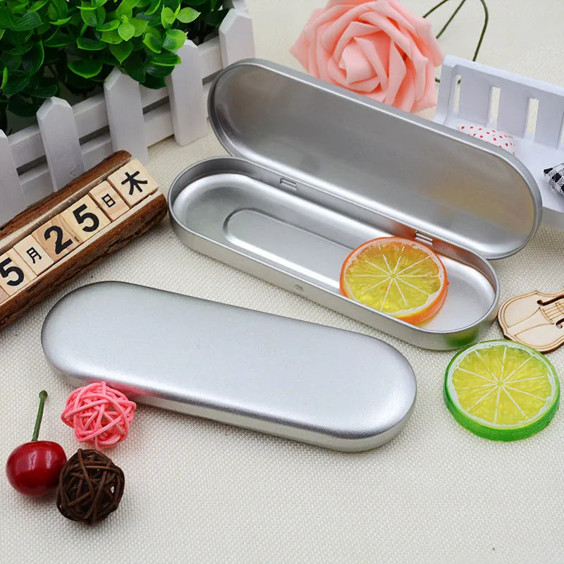 Rectangular tinplate cosmetic box with dimensions 175x60x18mm for pen storage