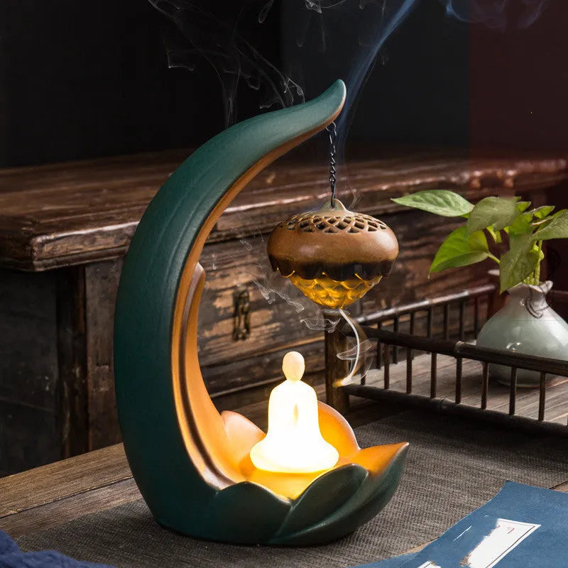 Handmade pottery Buddha statue ornament and ceramic backflow aroma diffuser with U-shaped power connection line