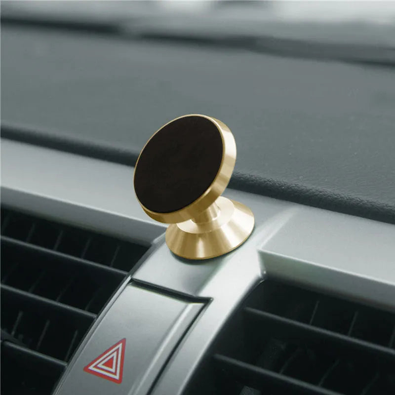 Universal magnetic car phone holder measuring 35.5mm x 40mm in black, silver and gold colour options