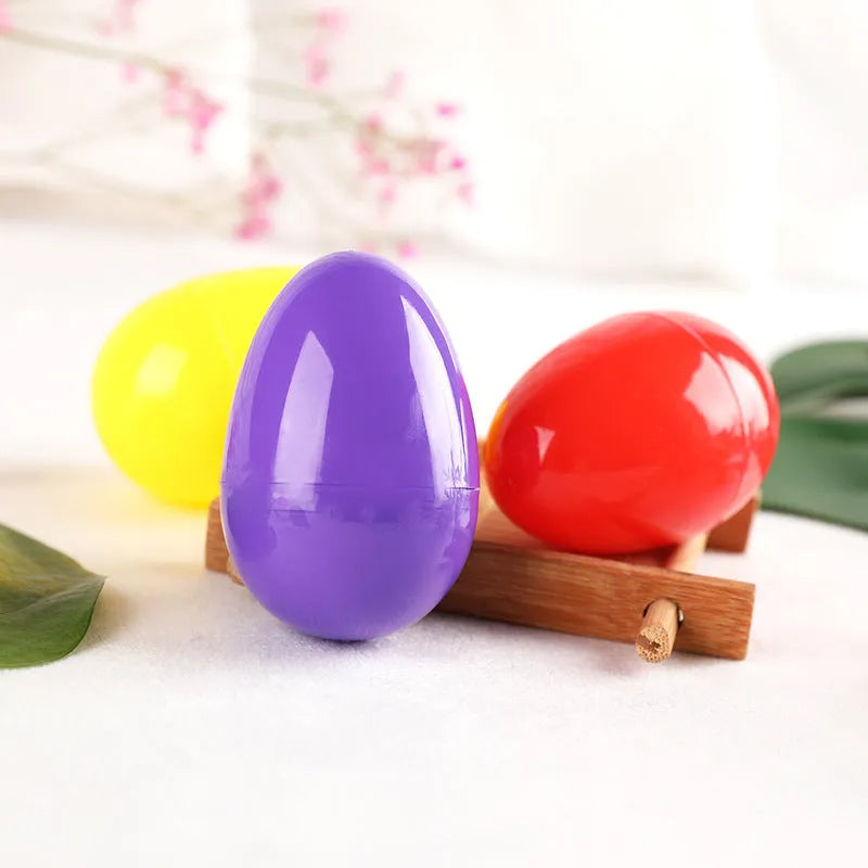 60 assorted colour fillable plastic Easter eggs 4x6cm each on a light background