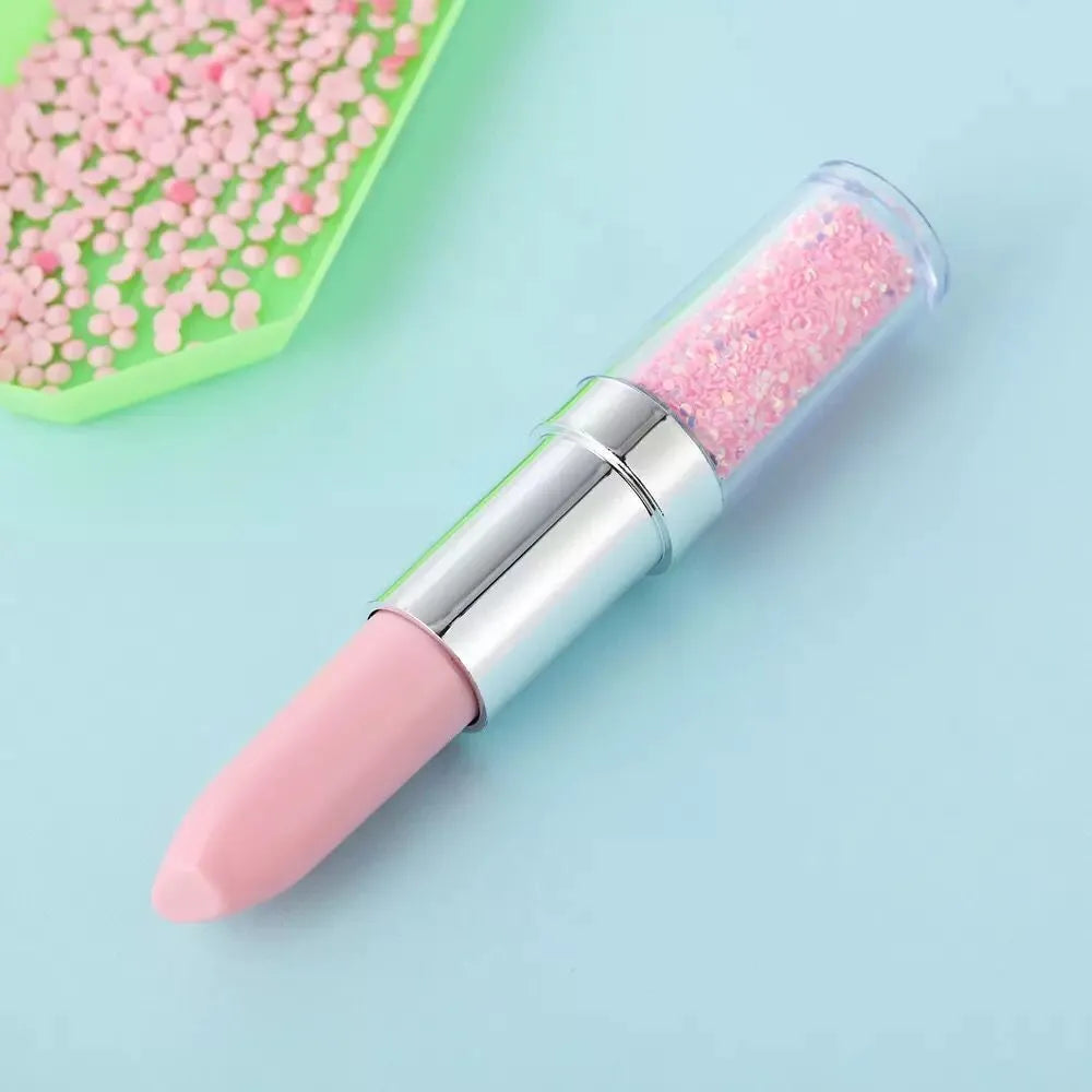A plastic diamond painting point drill pen shown in pink, purple, and green colour options.