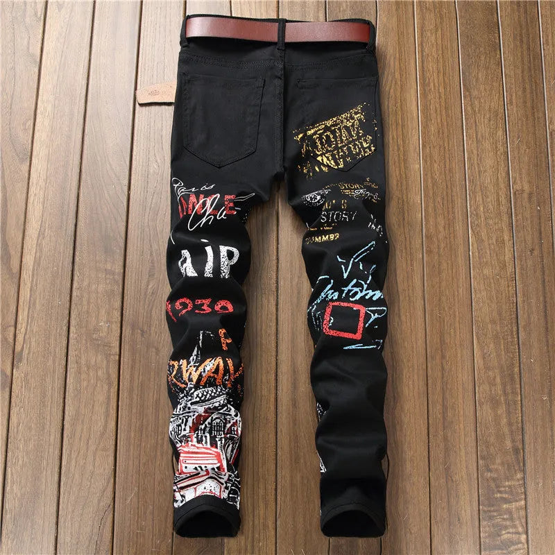 Men's slim fit graffiti print jeans, straight leg, mid waist, available in black or white, sizes 28-42.
