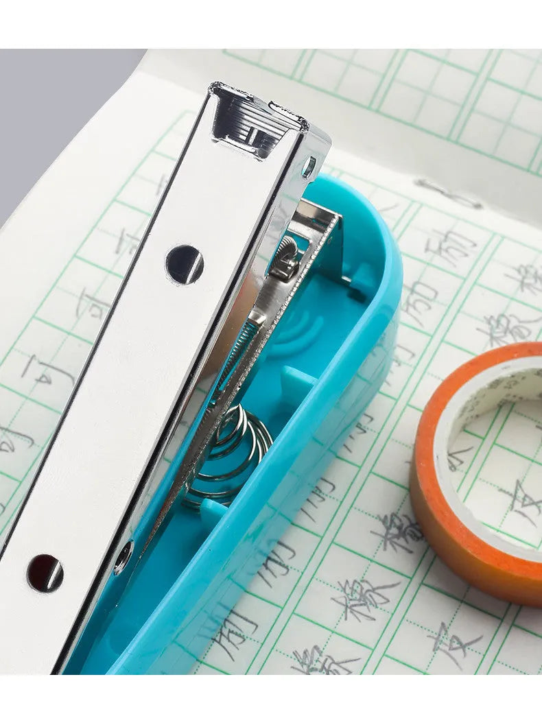 360-degree rotatable desktop stapler in various colours showing metal nail outlet and deep paper feed.