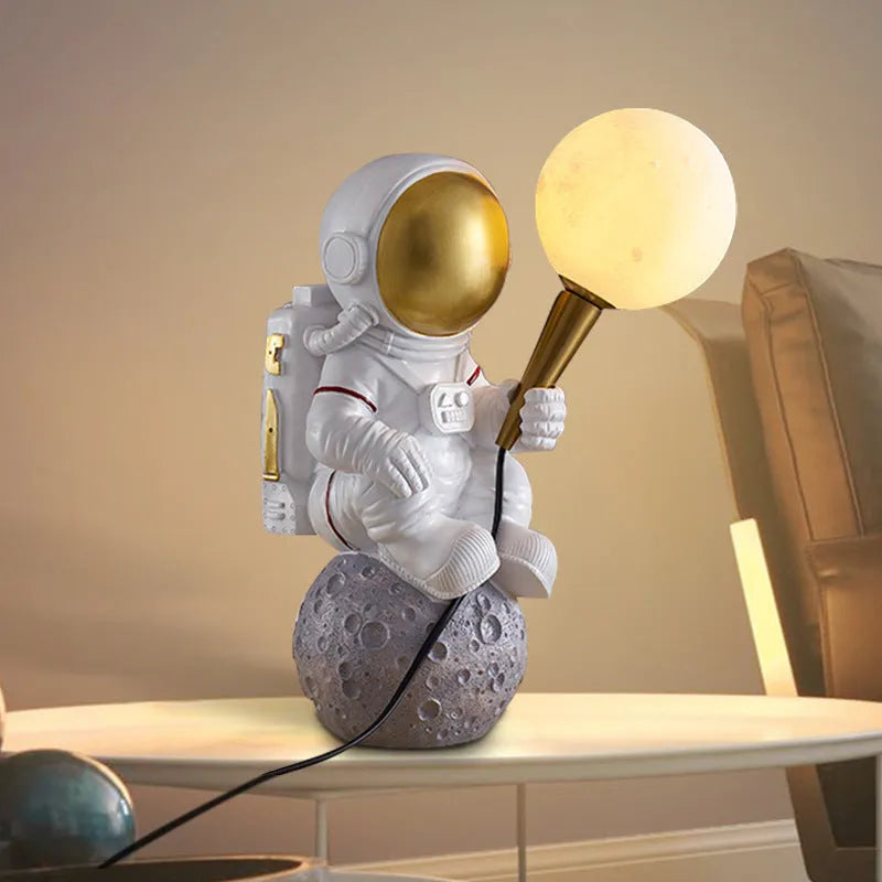 White astronaut desk lamp in standing, seated and wall-mounted styles for children's rooms
