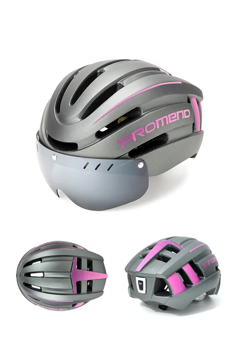 Mountain bike helmet in black with orange accents, integral moulding EPS PC construction, LED taillight at rear, size L 57-62 cm
