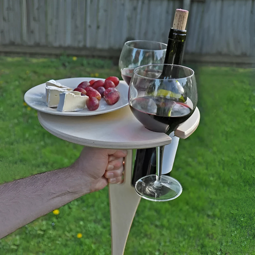 Outdoor foldable wooden wine rack with wine bottle and glasses on beach
