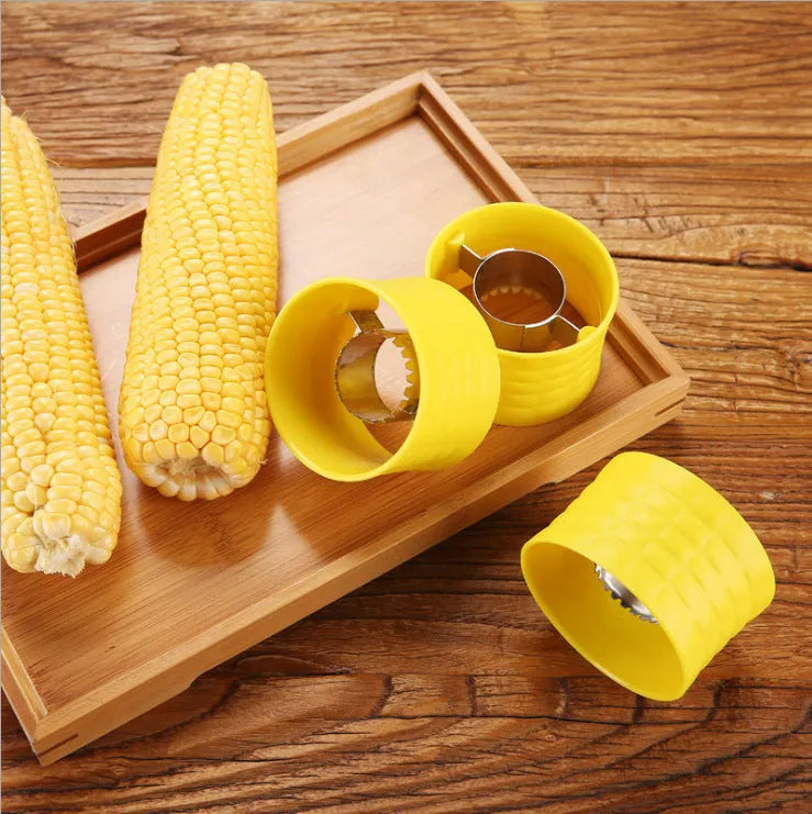 Yellow corn-shaped manual thresher with stainless steel gear for removing kernels from corn cobs