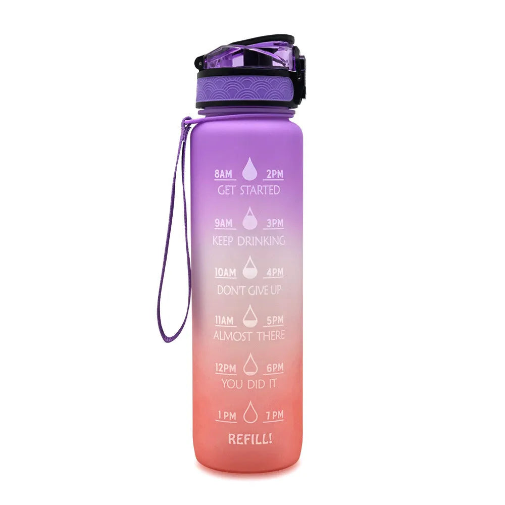 1L Tritan sports water bottle with time markers and flip-top lid in blue-red gradient colour