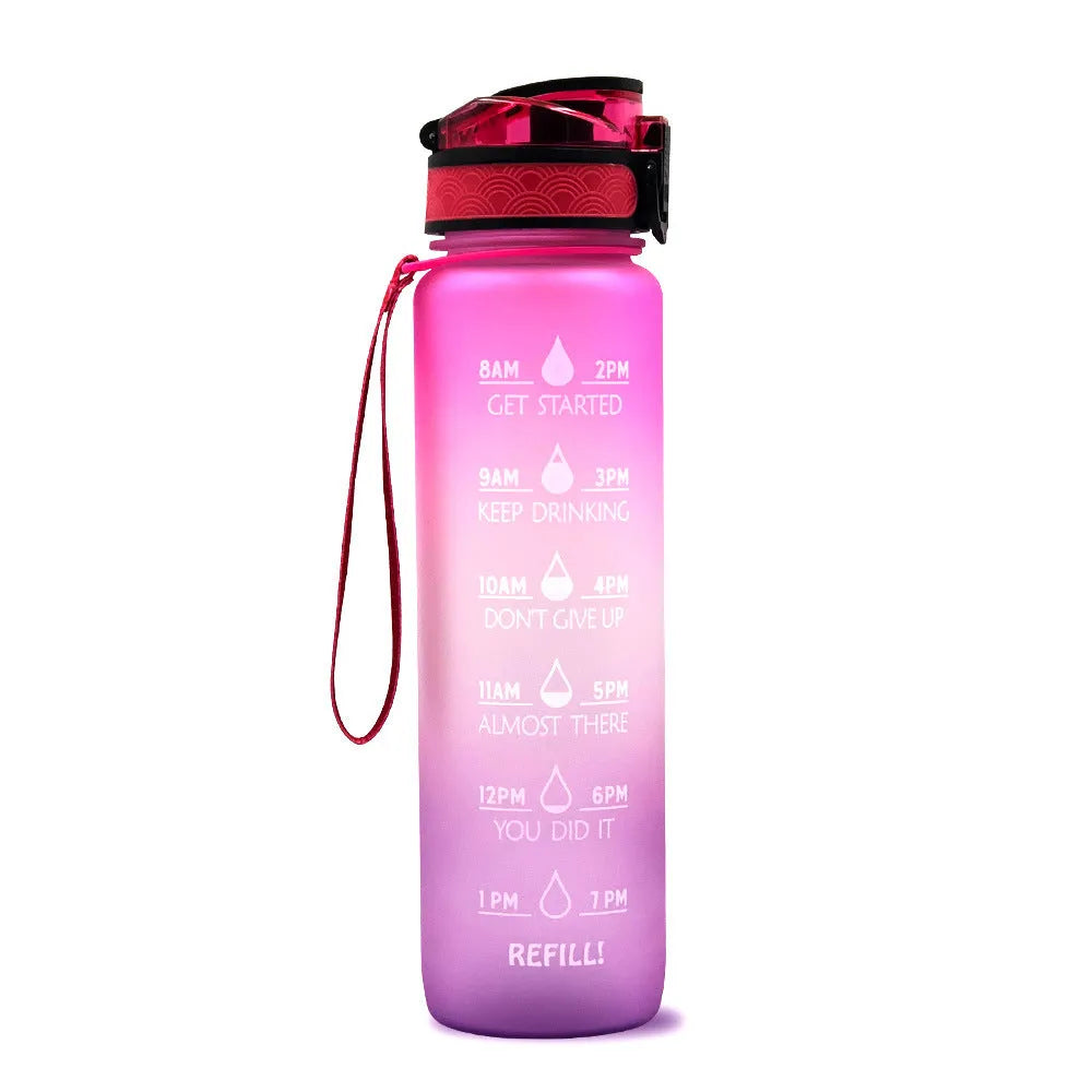 1L Tritan sports water bottle with time markers and flip-top lid in blue-red gradient colour