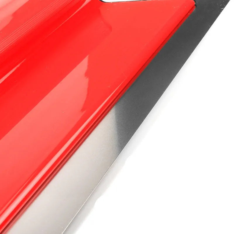 Red handle 40 cm long levelling scraper with stainless steel blade for wall putty and wallpaper.