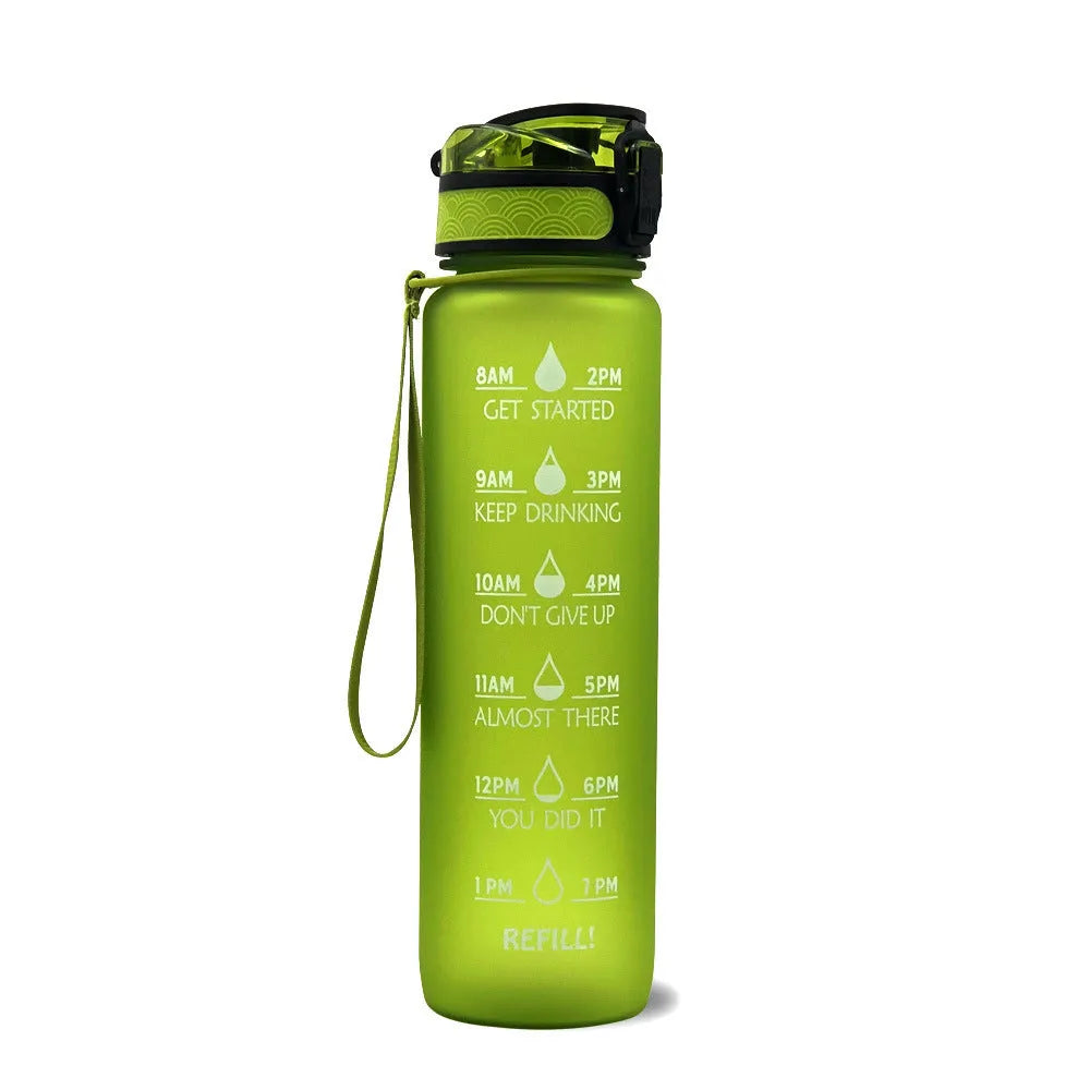 1L Tritan sports water bottle with time markers and flip-top lid in blue-red gradient colour