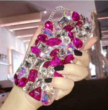 Clear TPU iPhone case with rhinestone decoration on the back, showing Black and Green colour options.