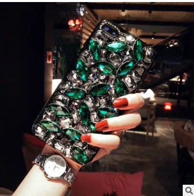 Clear TPU iPhone case with rhinestone decoration on the back, showing Black and Green colour options.