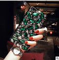Clear TPU iPhone case with rhinestone decoration on the back, showing Black and Green colour options.