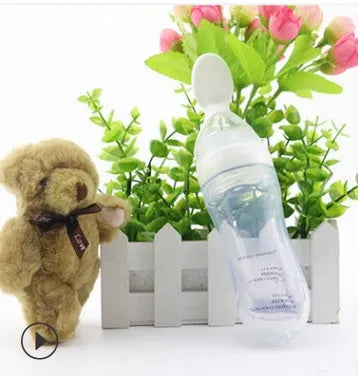 Baby silicone bottle feeder spoon with PP head for medicine, in blue, pink, yellow, or green colours