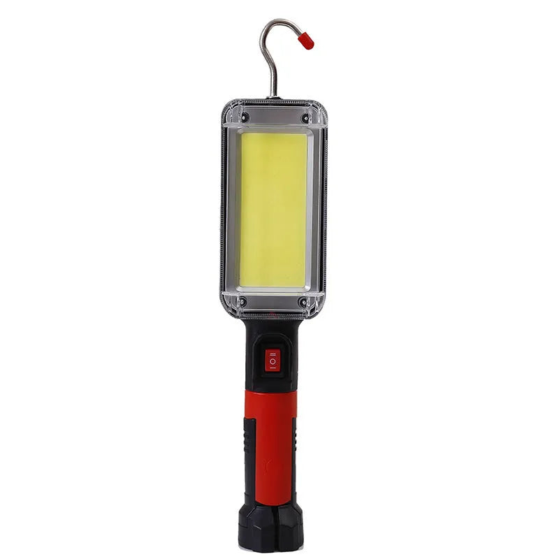 Black portable COB LED flashlight with magnet hook showing USB charging port