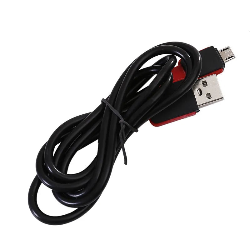 Black portable COB LED flashlight with magnet hook showing USB charging port